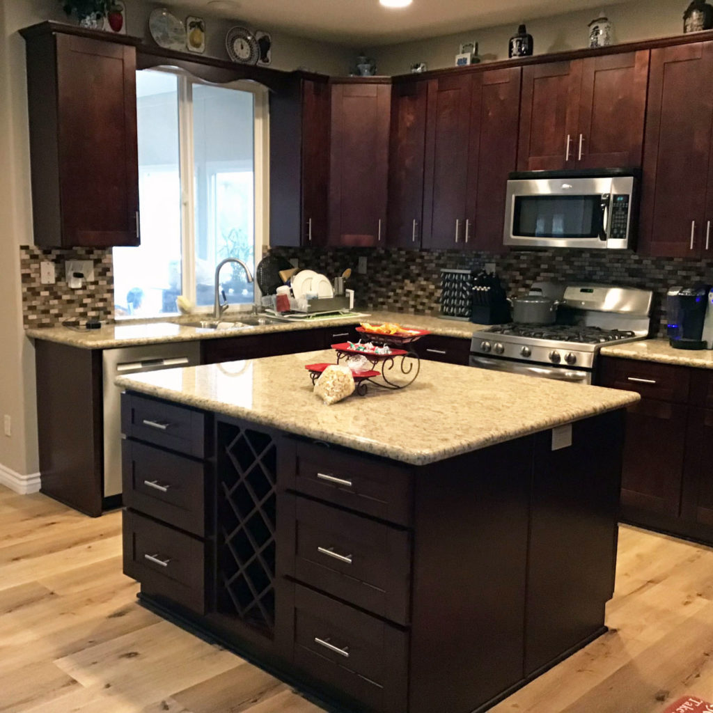 Modern dark-finish kitchen remodel in a manufactured home