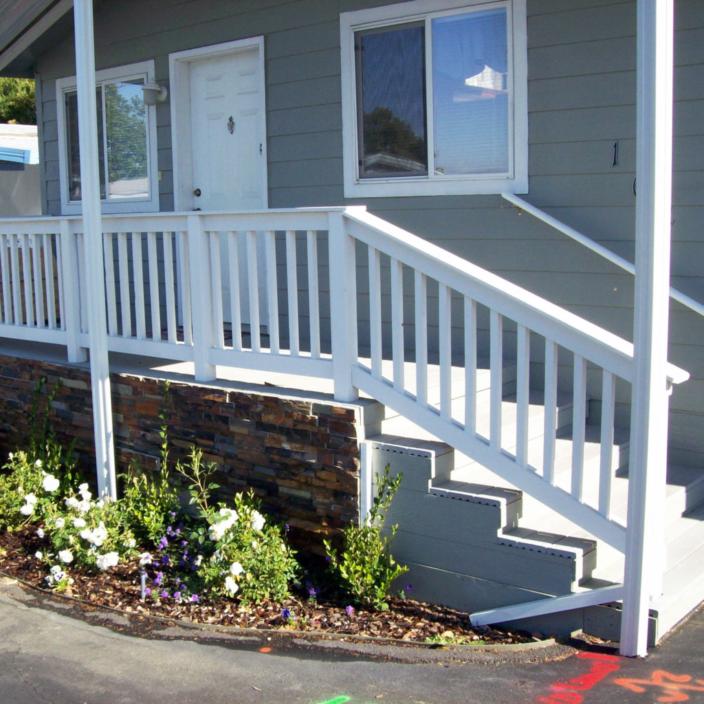 New handrail and steps installed on a mobile home